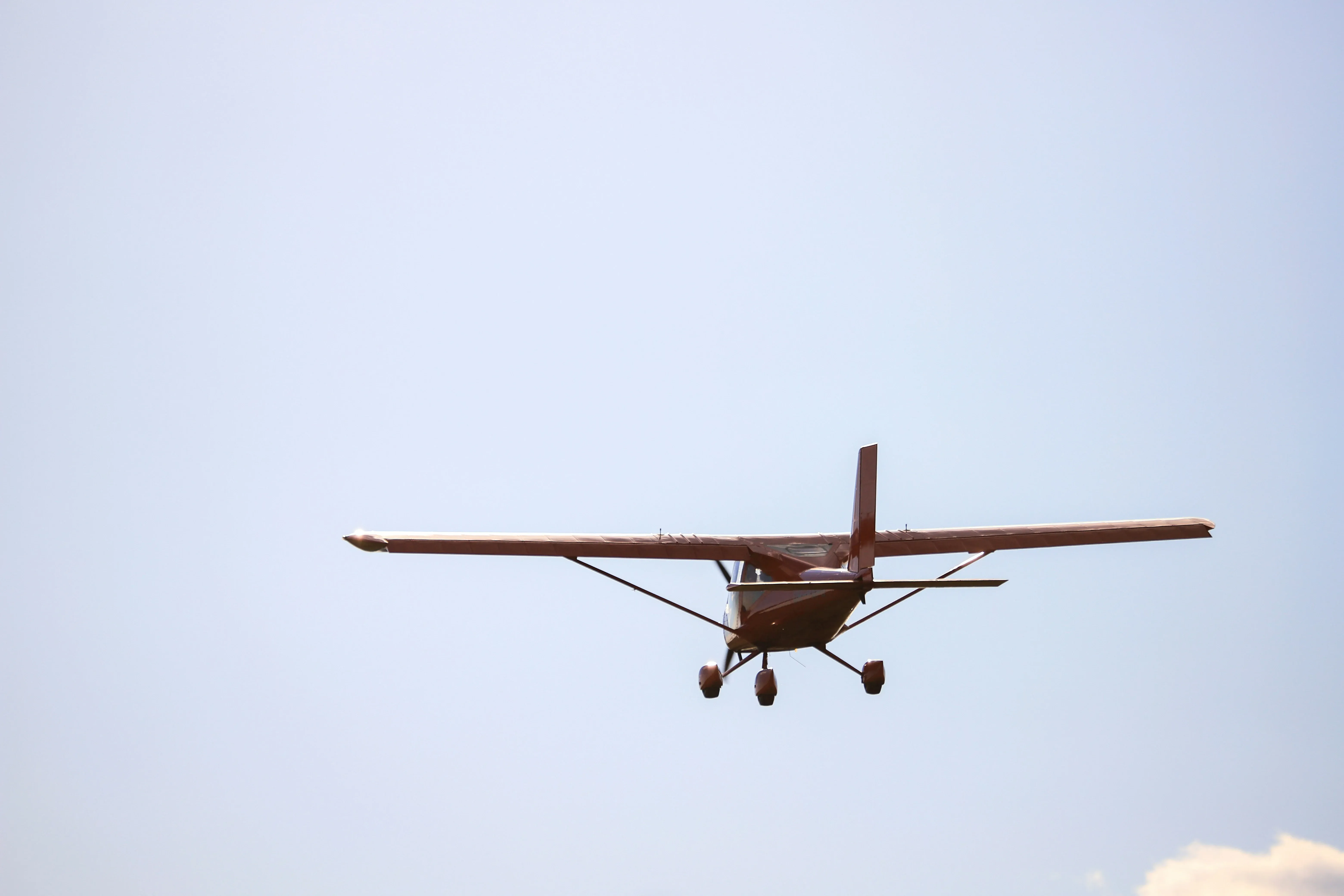 Speedway aircraft parked outside hangar at KHMP
